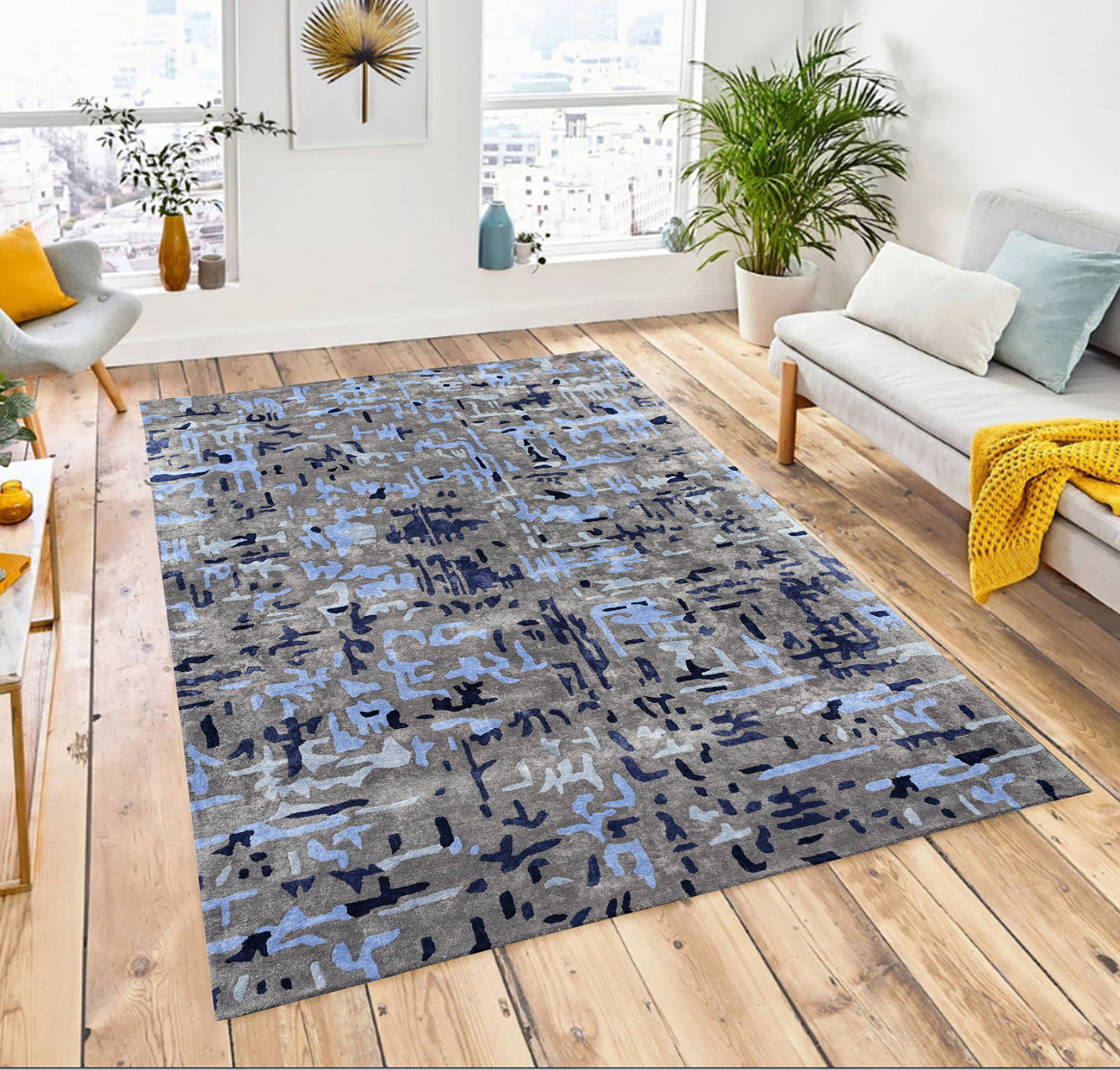 Gray blue rug styled in living room